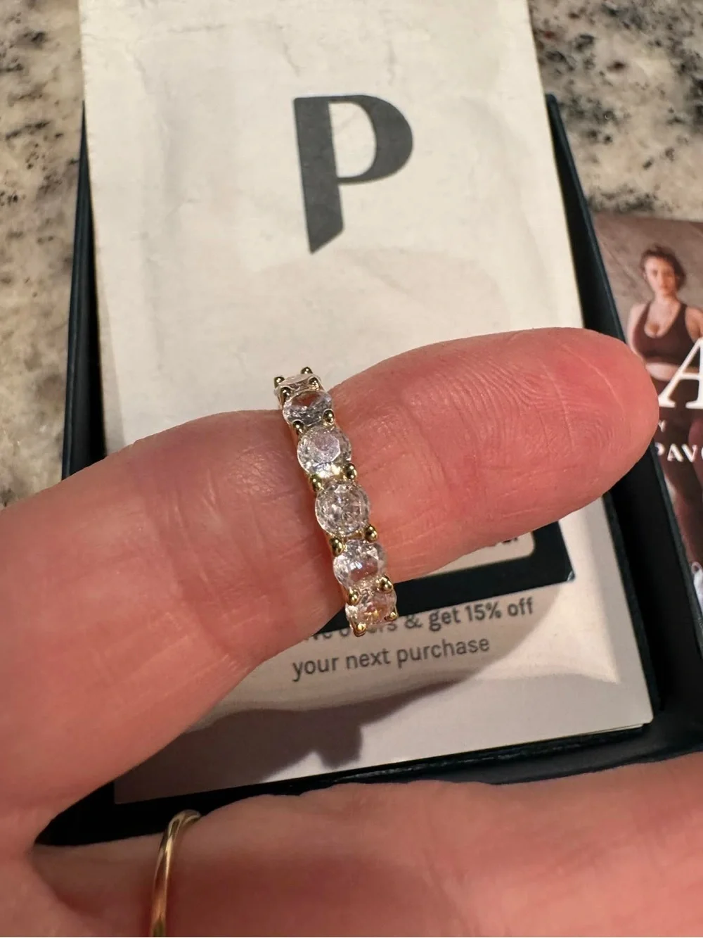 PAVOI Gold toned Eternity Ring with Clear Cubic Zirconia - Timeless Sparkle 5.5